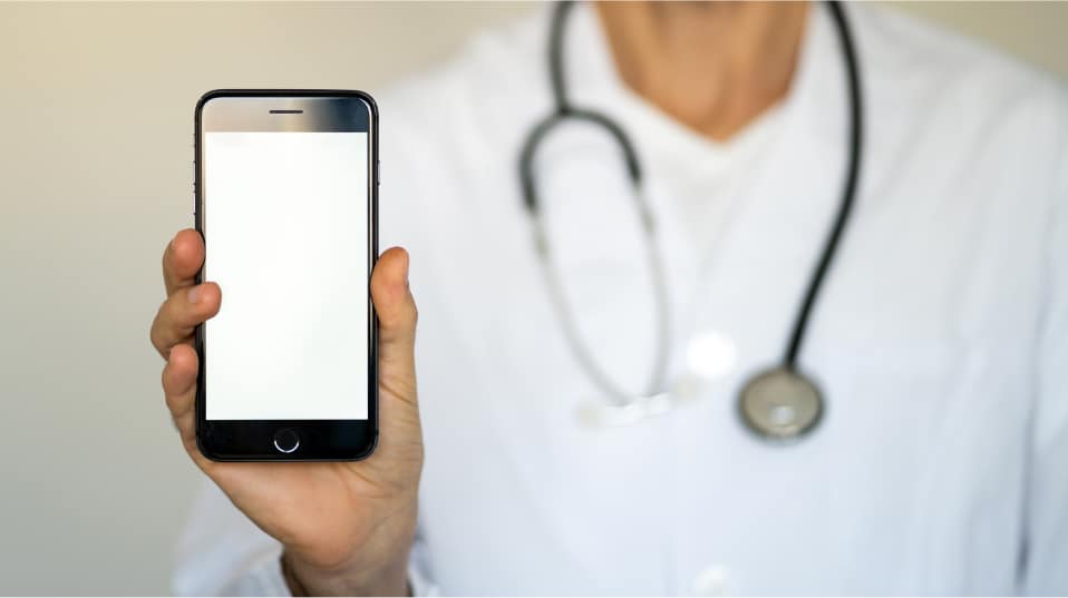 doctor showing a mobile phone screen